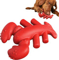 Red hard-material dog chew toy for large aggressive chewers, shown with size scale.