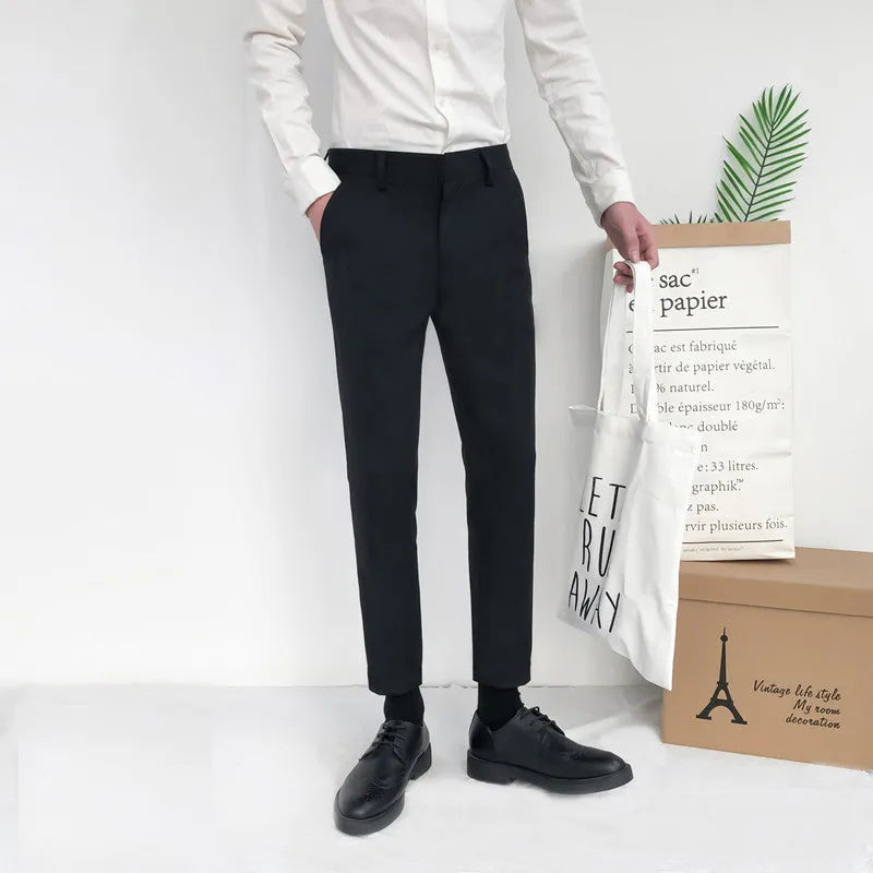 Men's straight-leg cotton trousers with drawstring waist in black, grey, and khaki colours