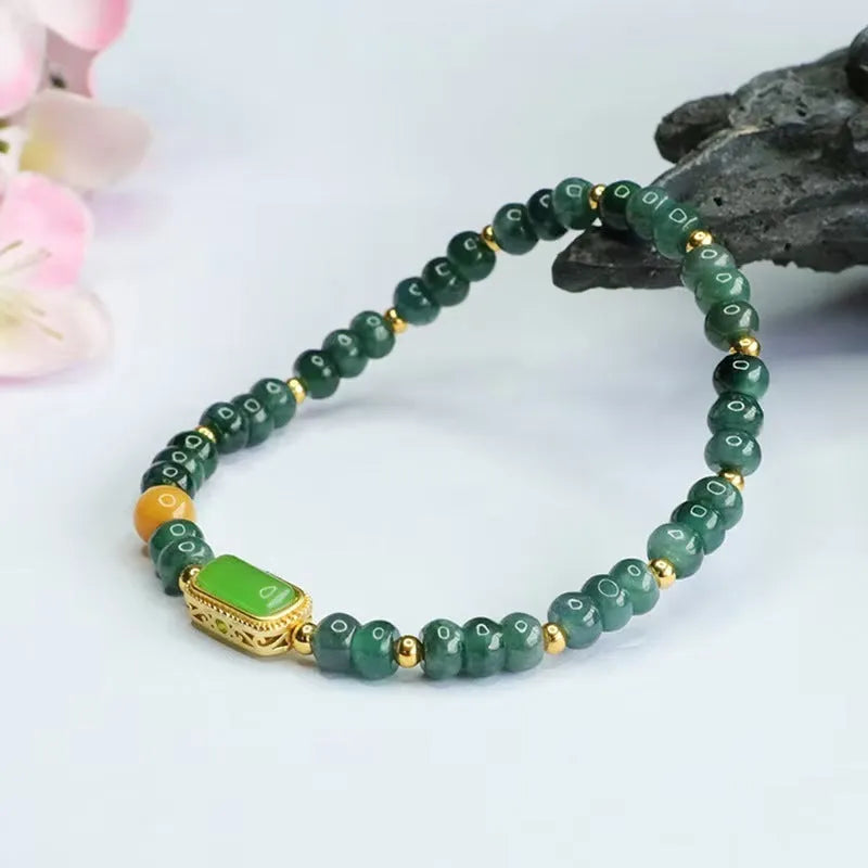 Natural stone blue water jade abacus bead bracelet with geometric design and metal spacers