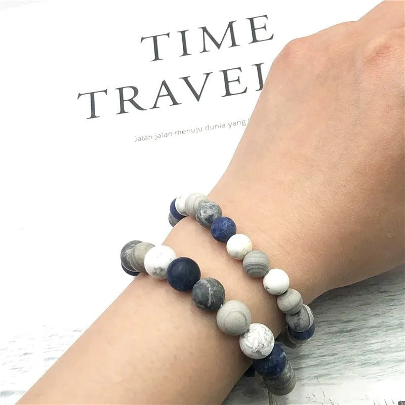 Handmade planet stone men's bracelet with U-shaped adjustable design showing natural stone beads