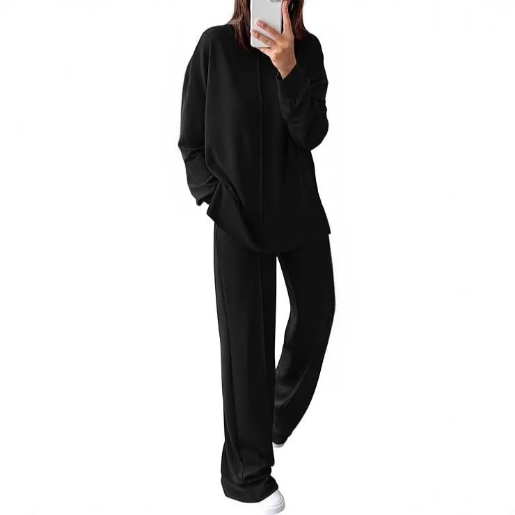 Women's army green polyester jogging suit set with long sleeves, shown as a matching top and trousers.