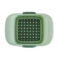 Green multi-functional vegetable chopper with stainless steel blades for French fries and onion dicing