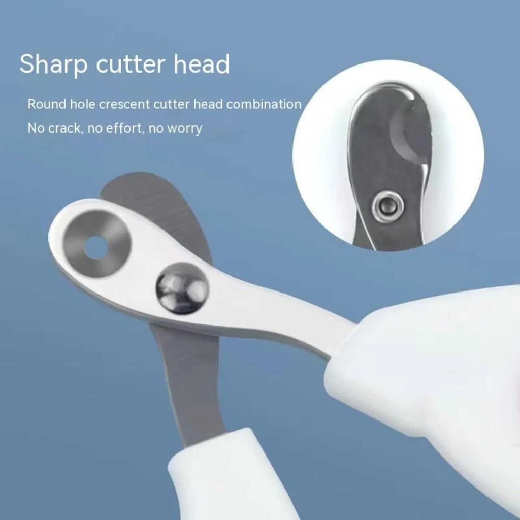Blue cat nail clippers with a circular cutting hole and cushioned handles on a white surface.