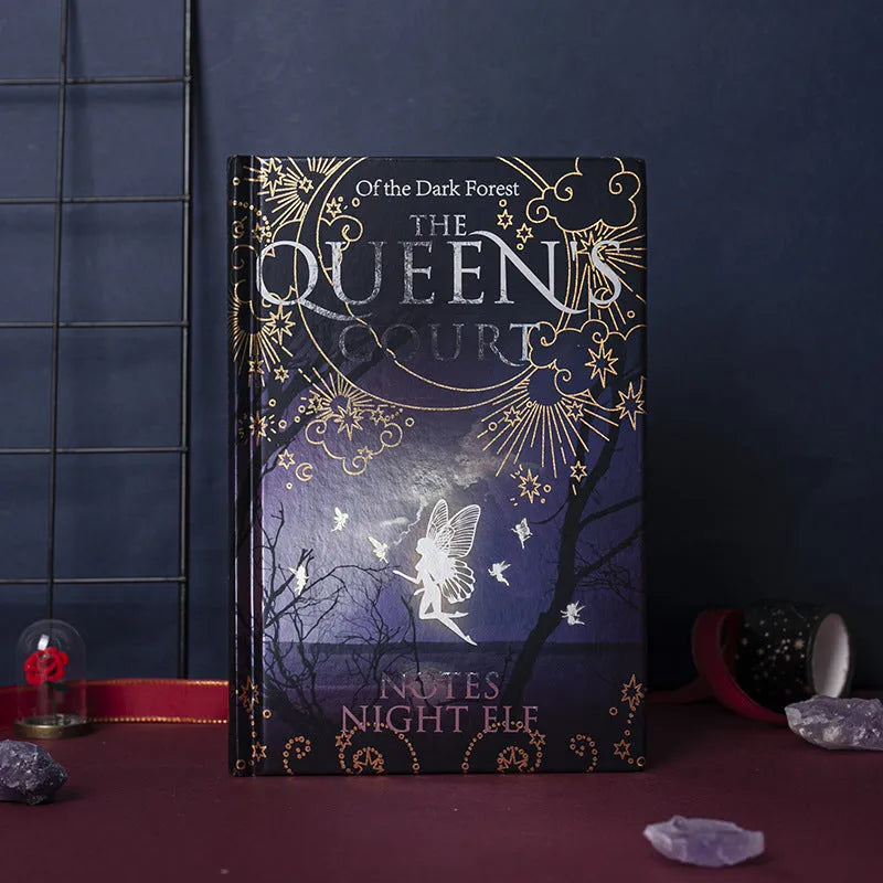 Blue retro luminous hardcover A5 notebook with Night Elves design, open to show full-colour illustrated pages.