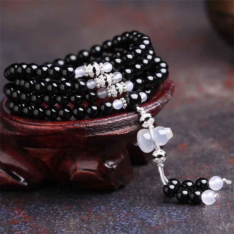 Black agate stone bead bracelet with 108 geometrically shaped beads and number element details