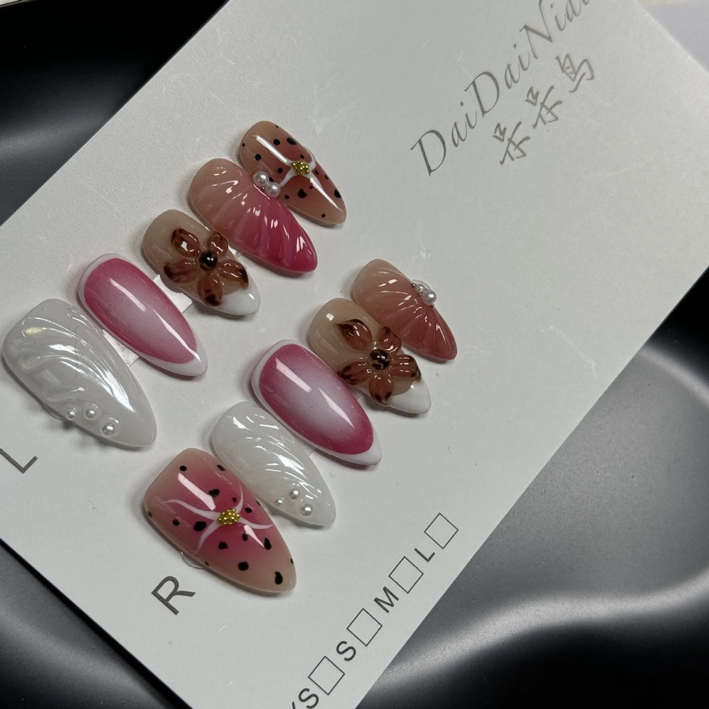 Hand-painted three-dimensional carved nail patches with embossed candy design in multiple colours