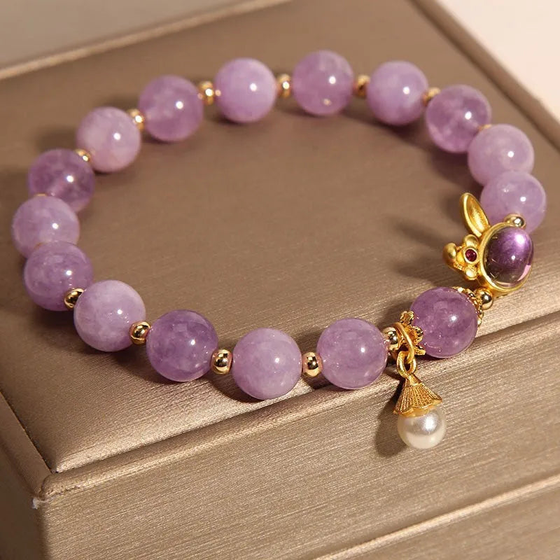 Natural mauve jade hare head crystal bracelet in Mori style with purplish red accents.