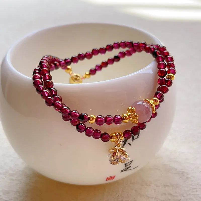 Women's natural garnet bracelet with double ring design and H311 colour garnet