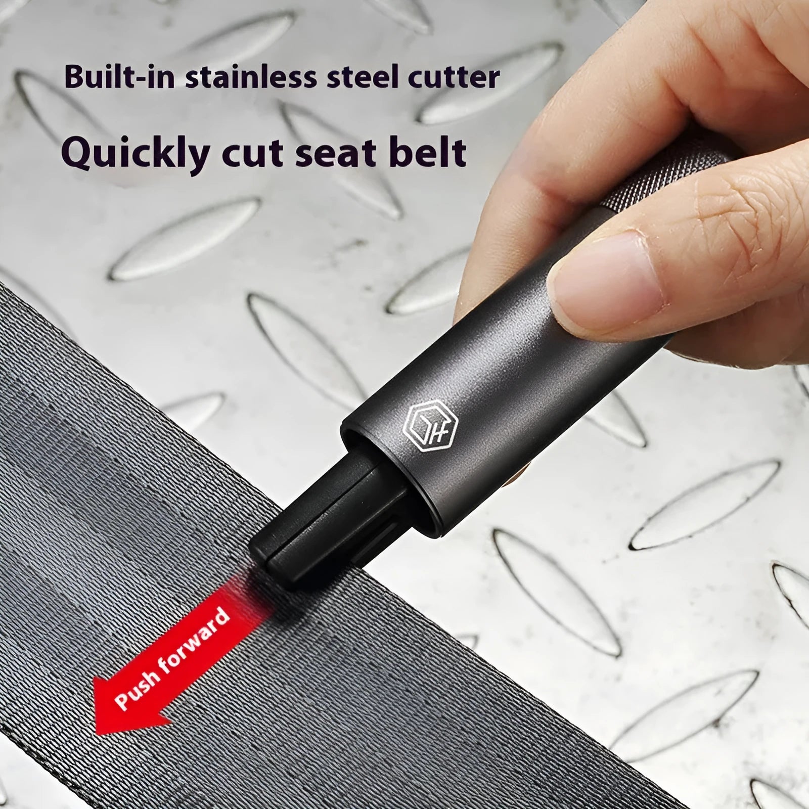Gun grey aluminium alloy automobile safety hammer with belt cutter on a 3M rubber base.