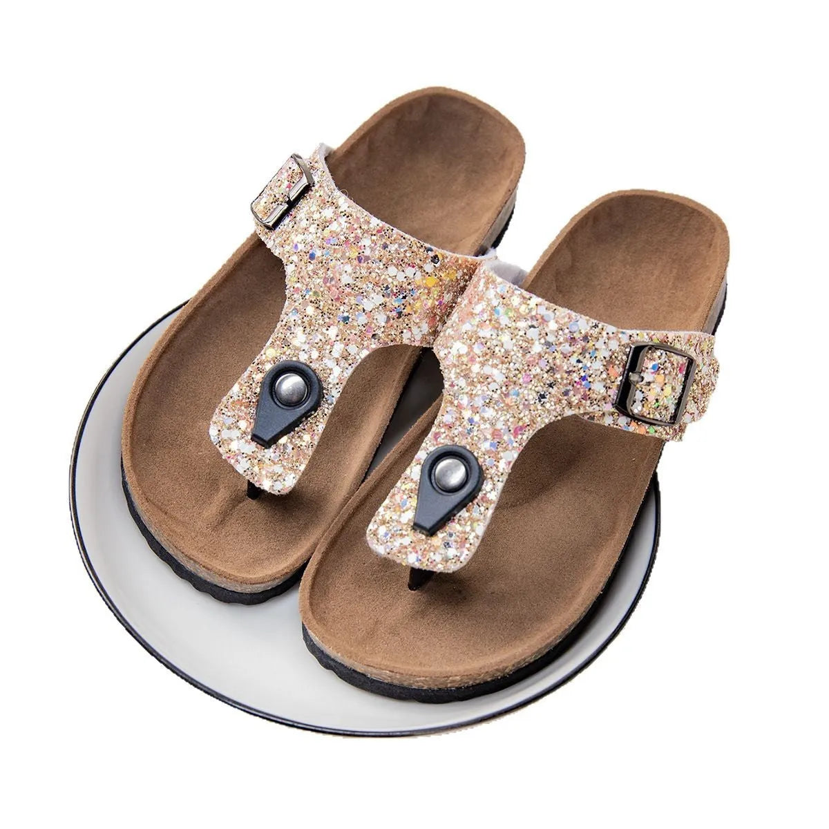 Cork flip-flops in pink, silver, and gold colours with artificial leather uppers and PVC soles