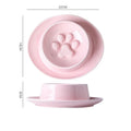 Green ceramic slow feeder pet bowl with anti-choke basin and neck protection design.