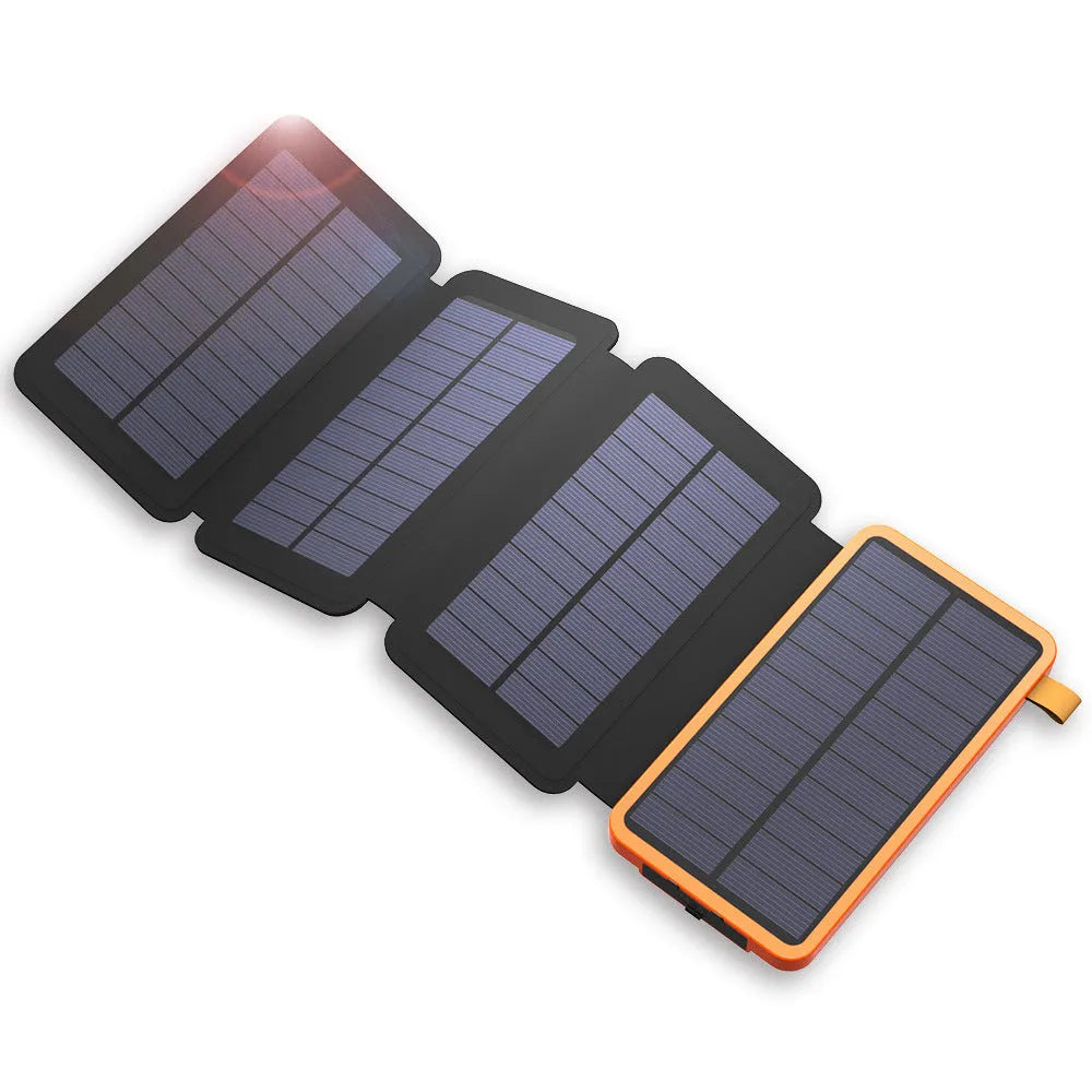 A black outdoor solar power bank with a solar panel, LED light, and soft leather finish, shown with a charging cable.