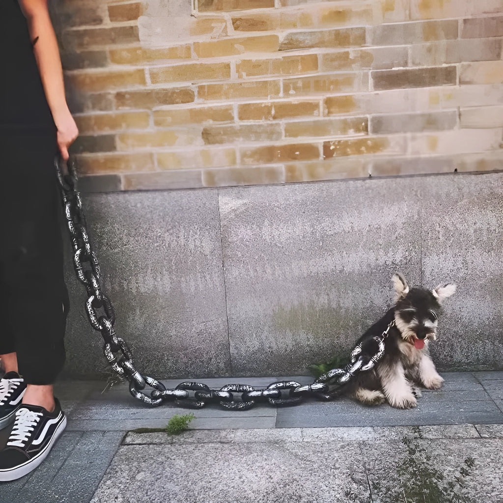 Metallic polypropylene simulation dog leash prop in bronze, silver, and black colours on a white background.