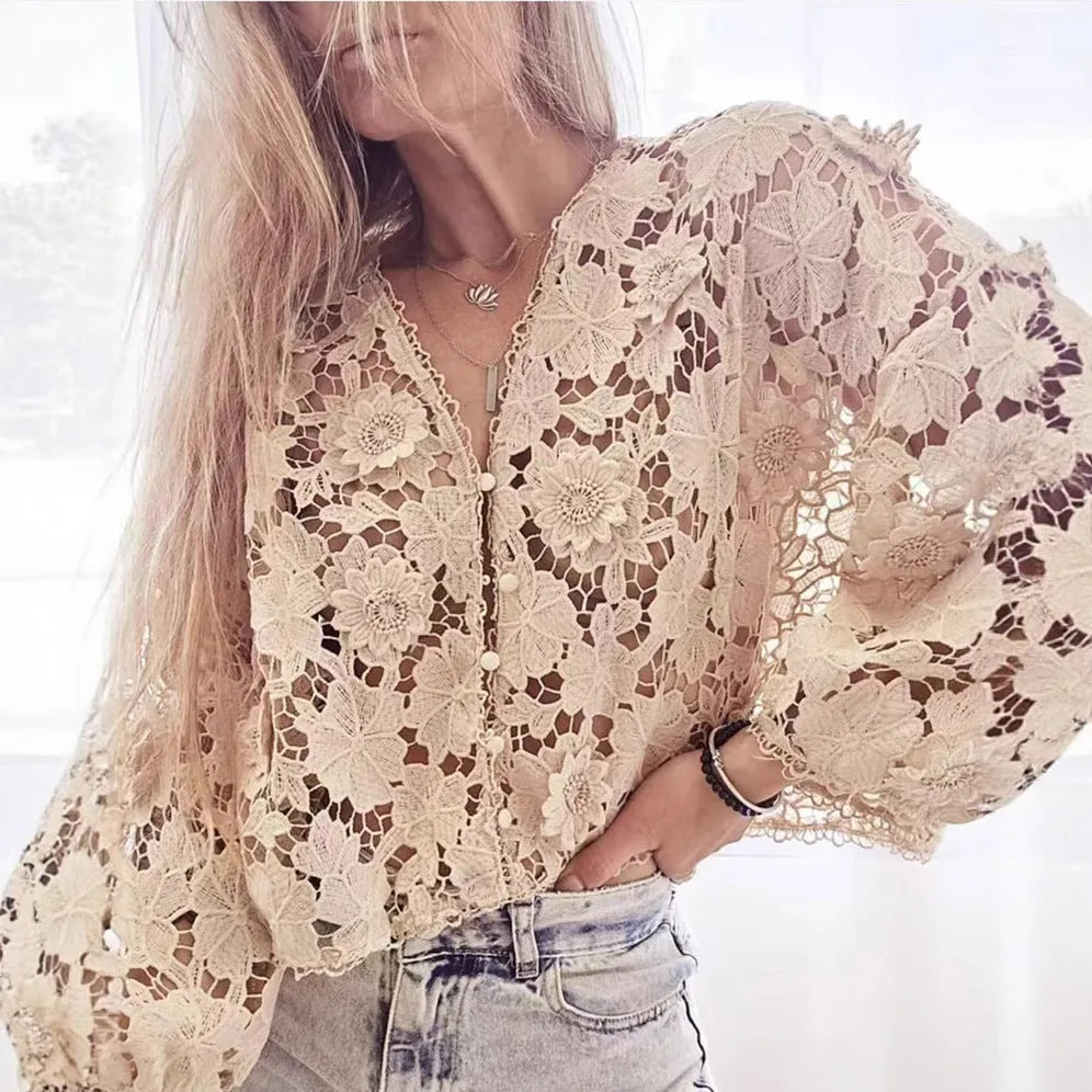 Women's loose fit V-neck lace cardigan with 3D flower decorations and hollow long sleeves in black.