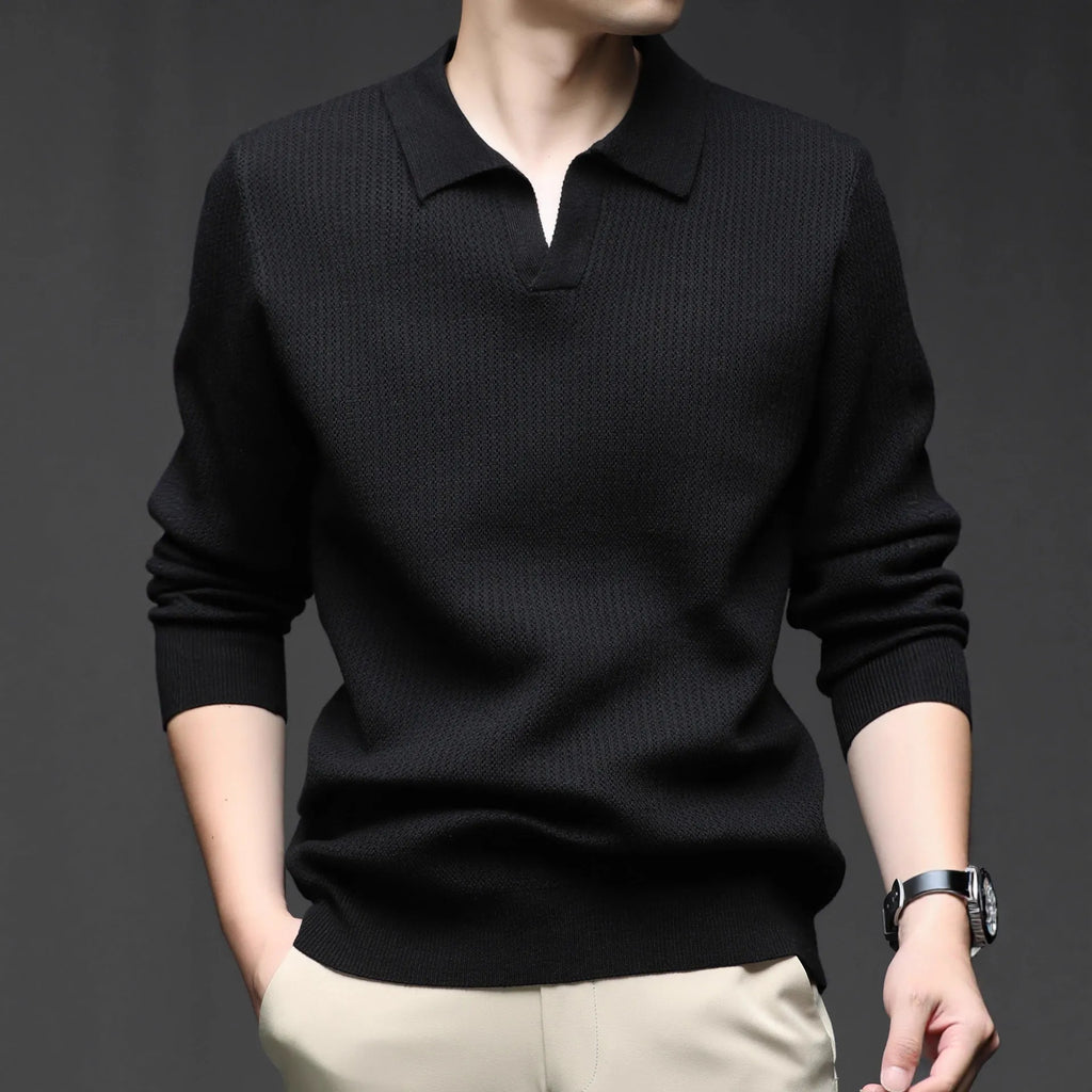 Man modelling a loose-fit green casual pullover sweater for autumn.