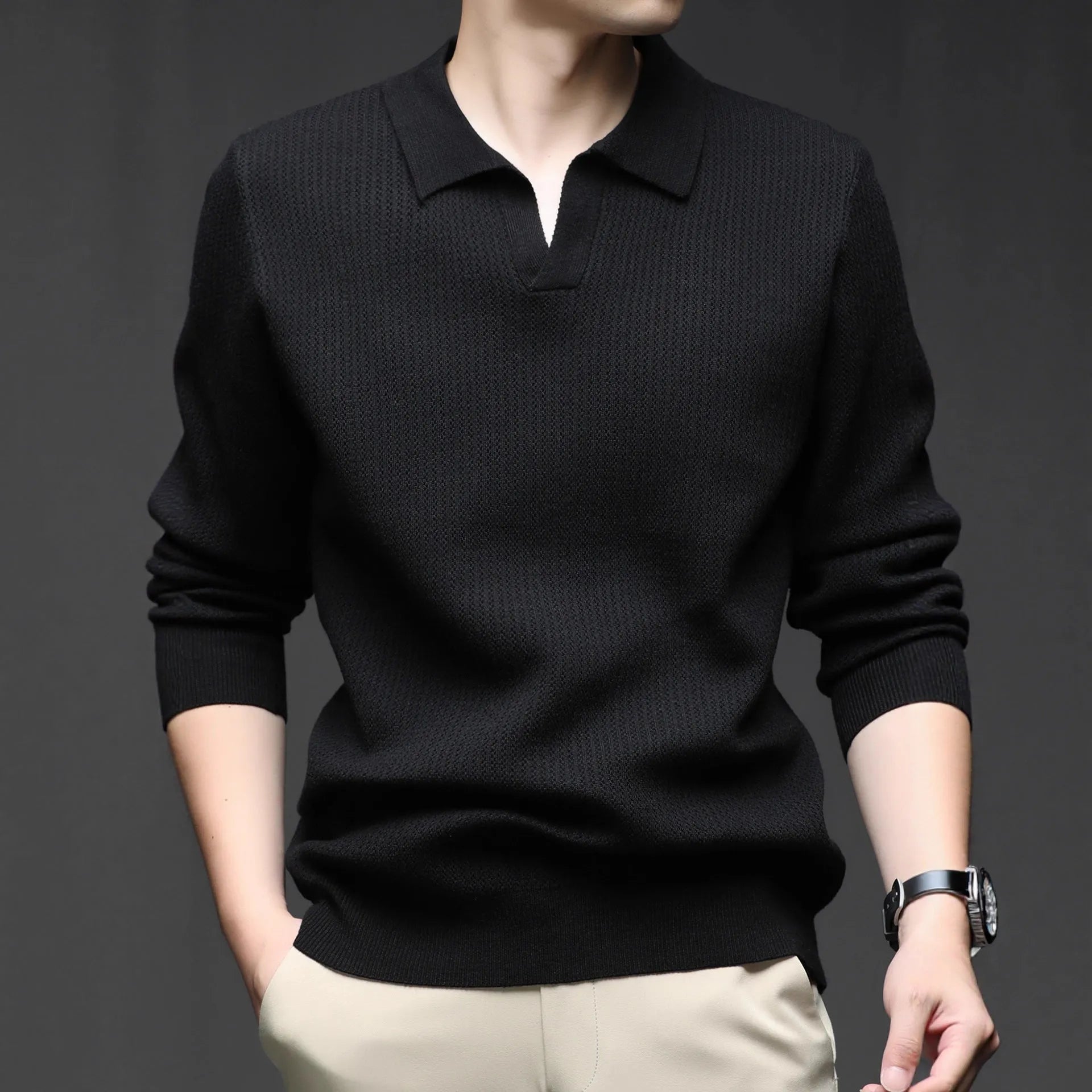 Man modelling a loose-fit green casual pullover sweater for autumn.