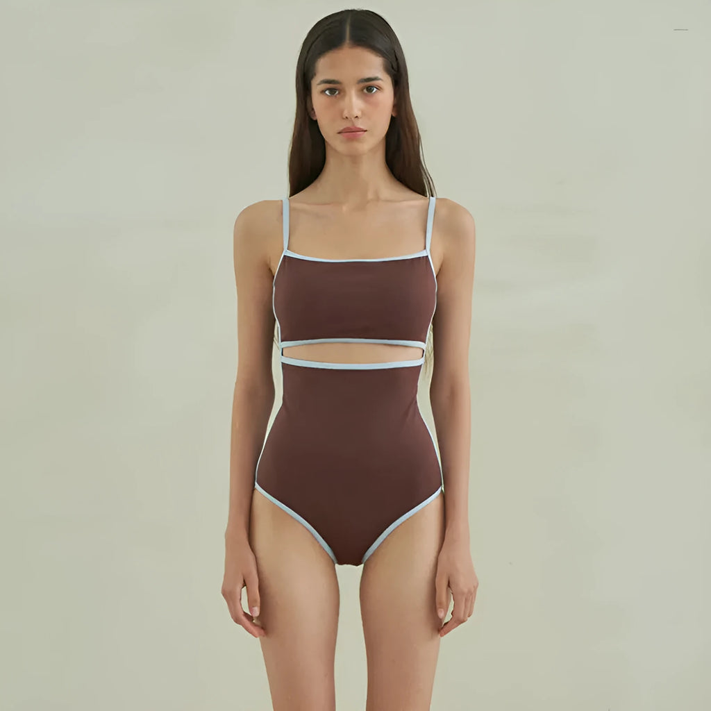 Brown triangle style one-piece swimsuit for women on a hanger