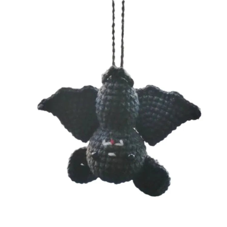 Plush hand-woven car hanging ornament in a cartoon style, made from polyester fabric.
