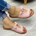 Ladies fish mouth style sandals with a decorative bow, shown in black, pink, and gold colour options.