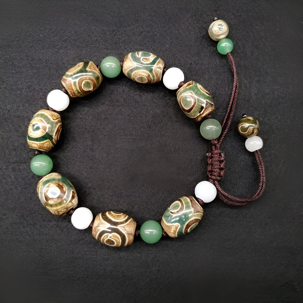 Green agate ethnic bracelet with hand-woven Tibetan beads and geometric patterns