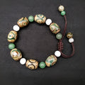 Green agate ethnic bracelet with hand-woven Tibetan beads and geometric patterns