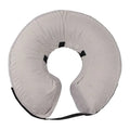 Blue inflatable soft recovery collar for a dog, shown as an alternative to a plastic cone.