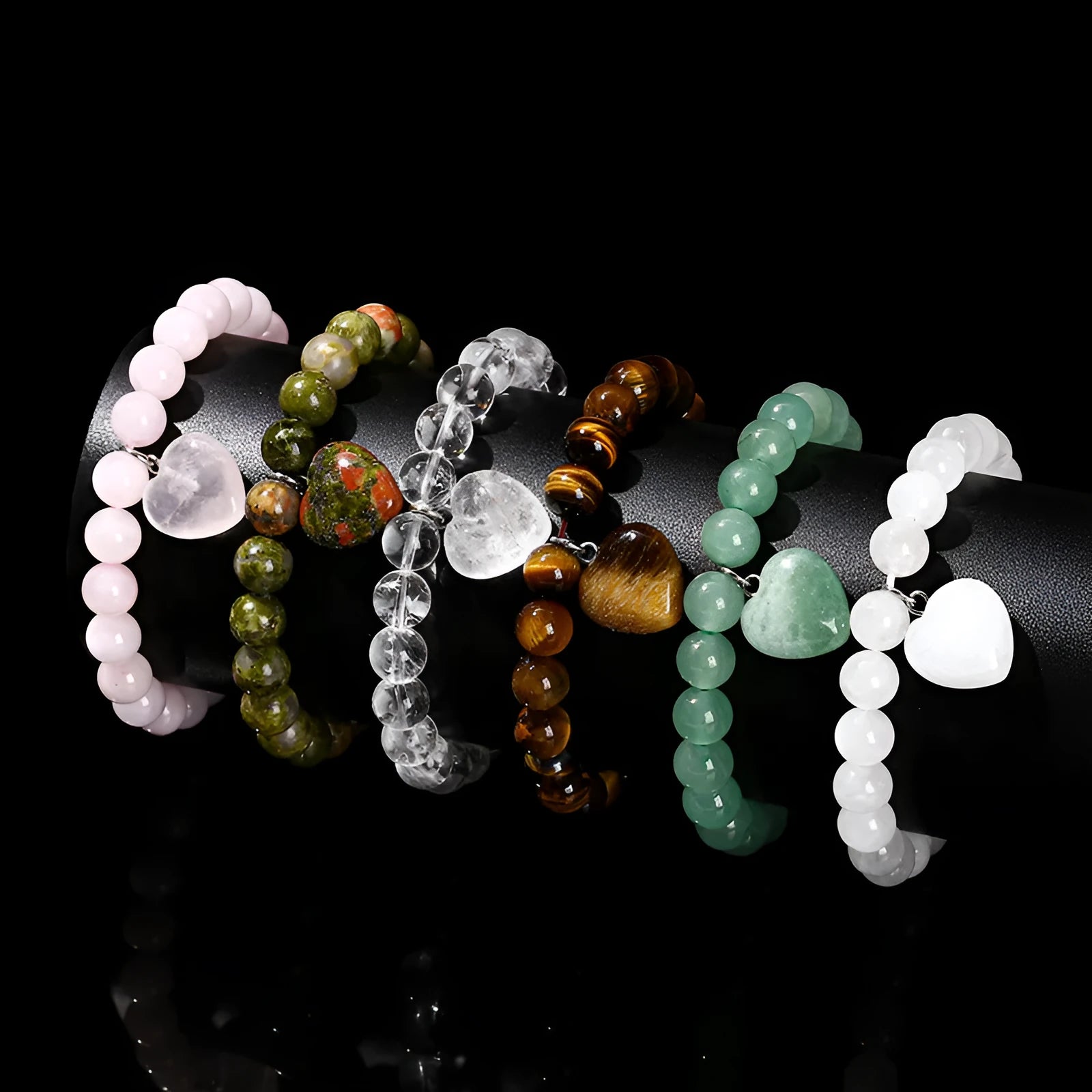 Natural stone bracelet with geometric heart pendant showing 8mm or 10mm beads in crystal colours