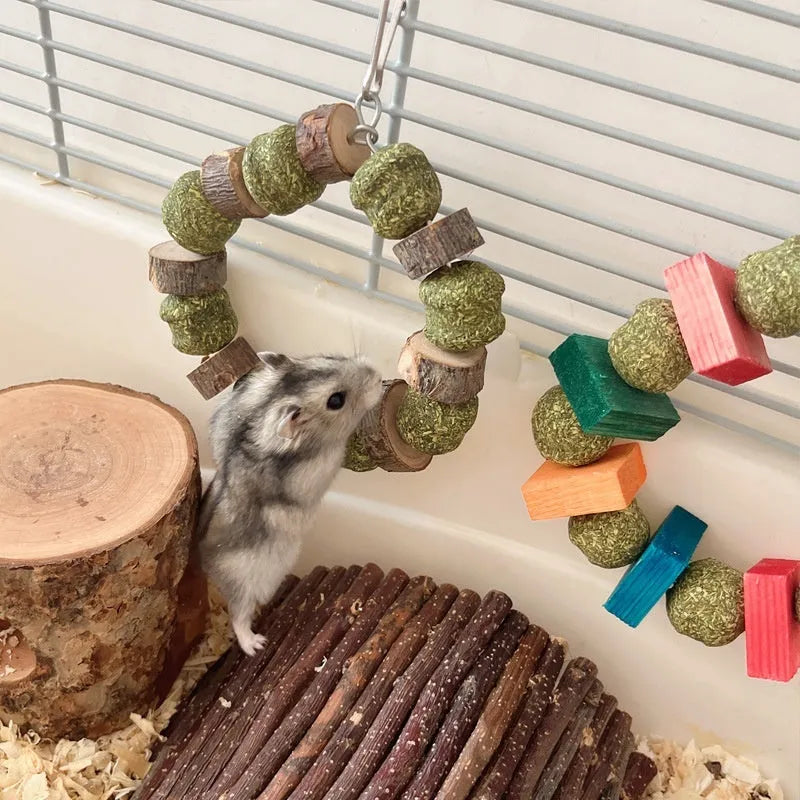 Small pet chew toy with straw ball ring design in colour sequin and applewood styles
