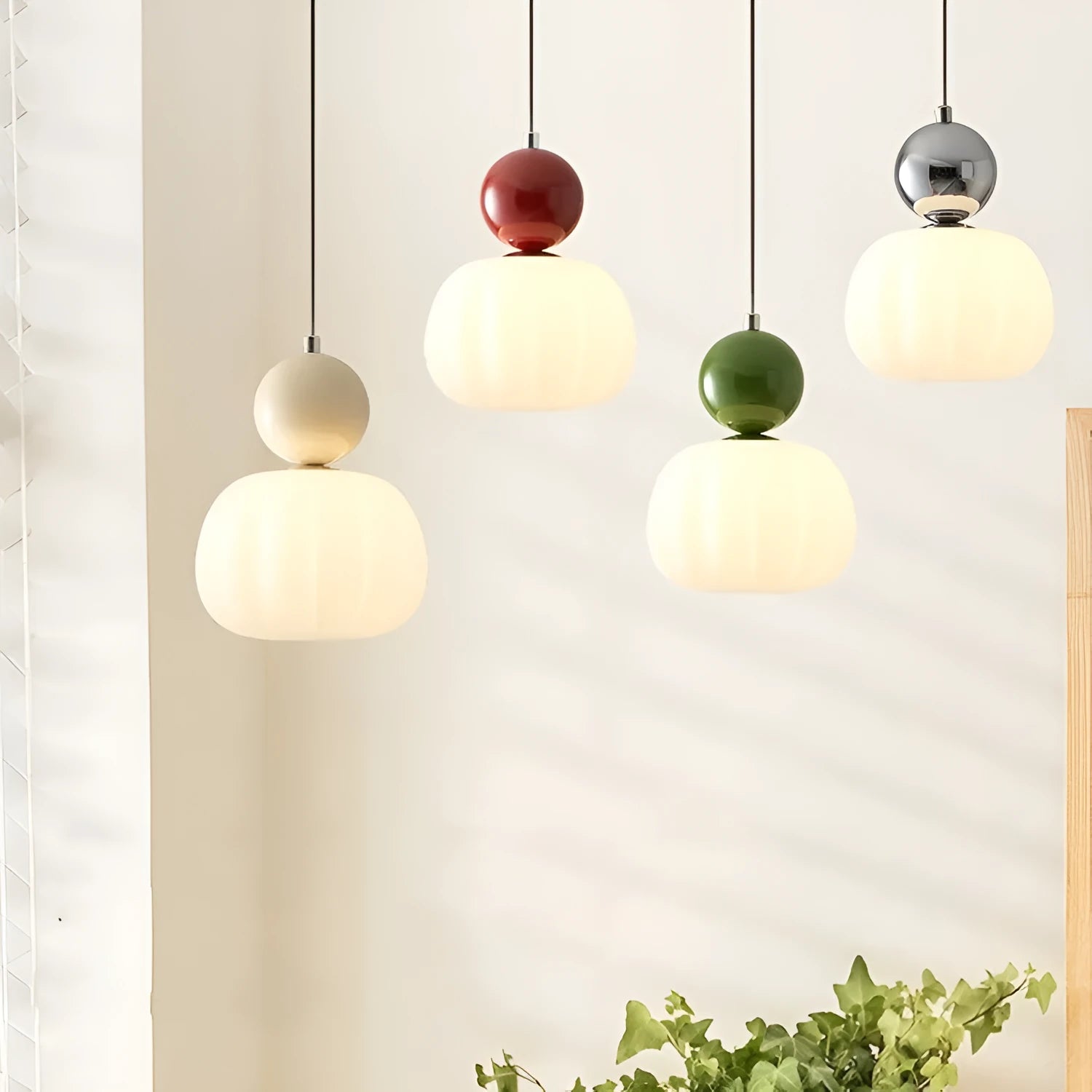 Creative pumpkin-shaped Nordic style ceiling chandelier in alloy, shown in single head and three head configurations.