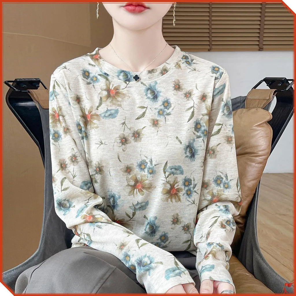 Women's round neck floral print pullover shirt in Tencel cotton fabric on a model.