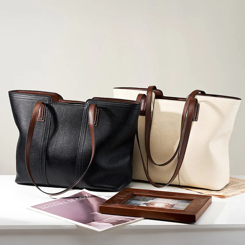 Women's black genuine leather crossbody bag with horizontal square shape and single shoulder strap