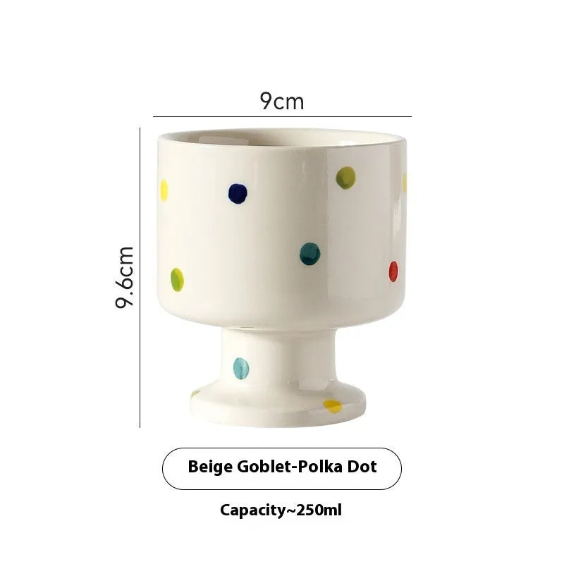 Hand-pinched irregular ceramic mug in solid colour with modern simple design