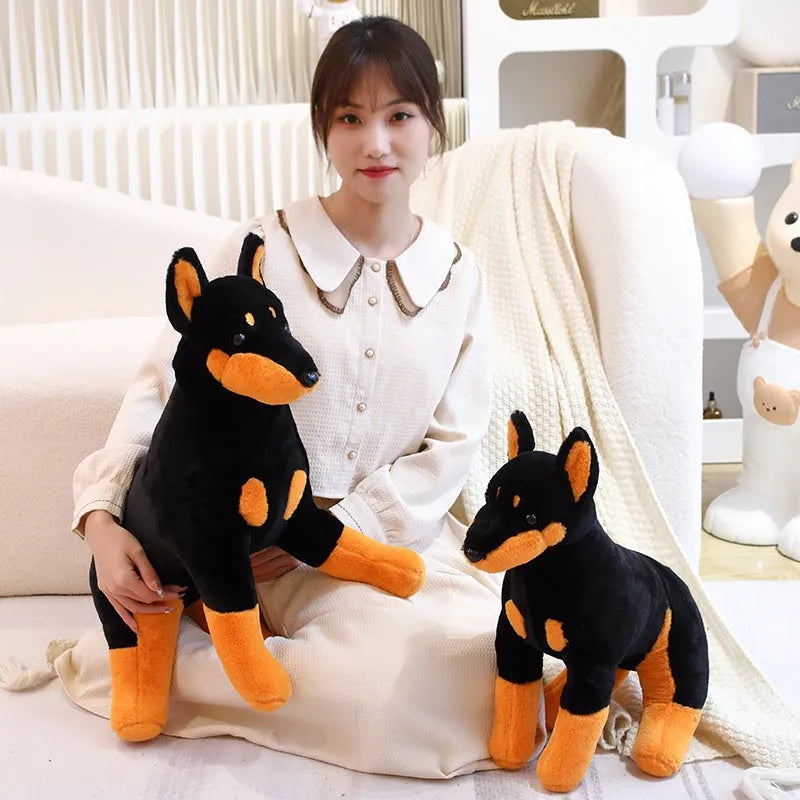Black Doberman Pinscher plush toy with short plush surface, available in 40cm or 55cm sizes