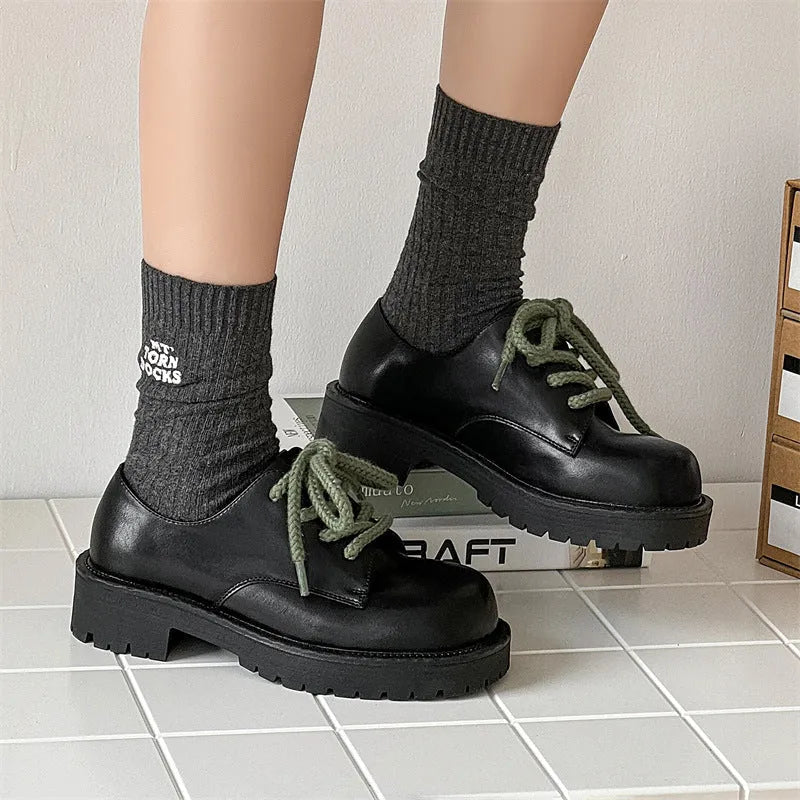 Big Head derby platform casual shoes in leather-look microfiber with a height-increasing rubber sole.