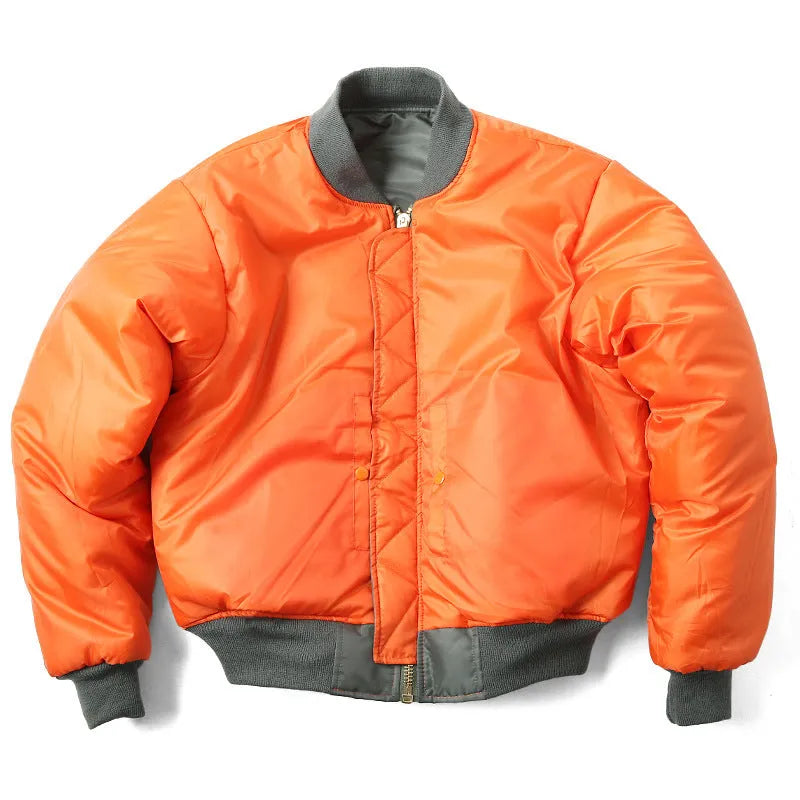 Man wearing a reversible army green nylon pilot jacket, showing the double-sided workwear design.