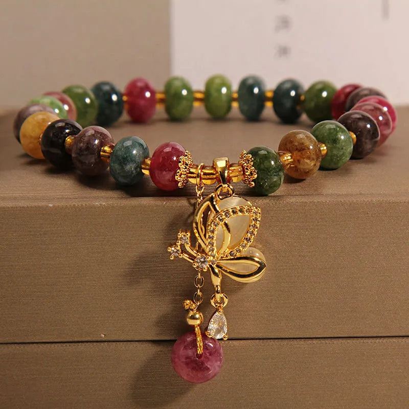 Colourful women's butterfly bracelet with tourmaline beads on alloy construction