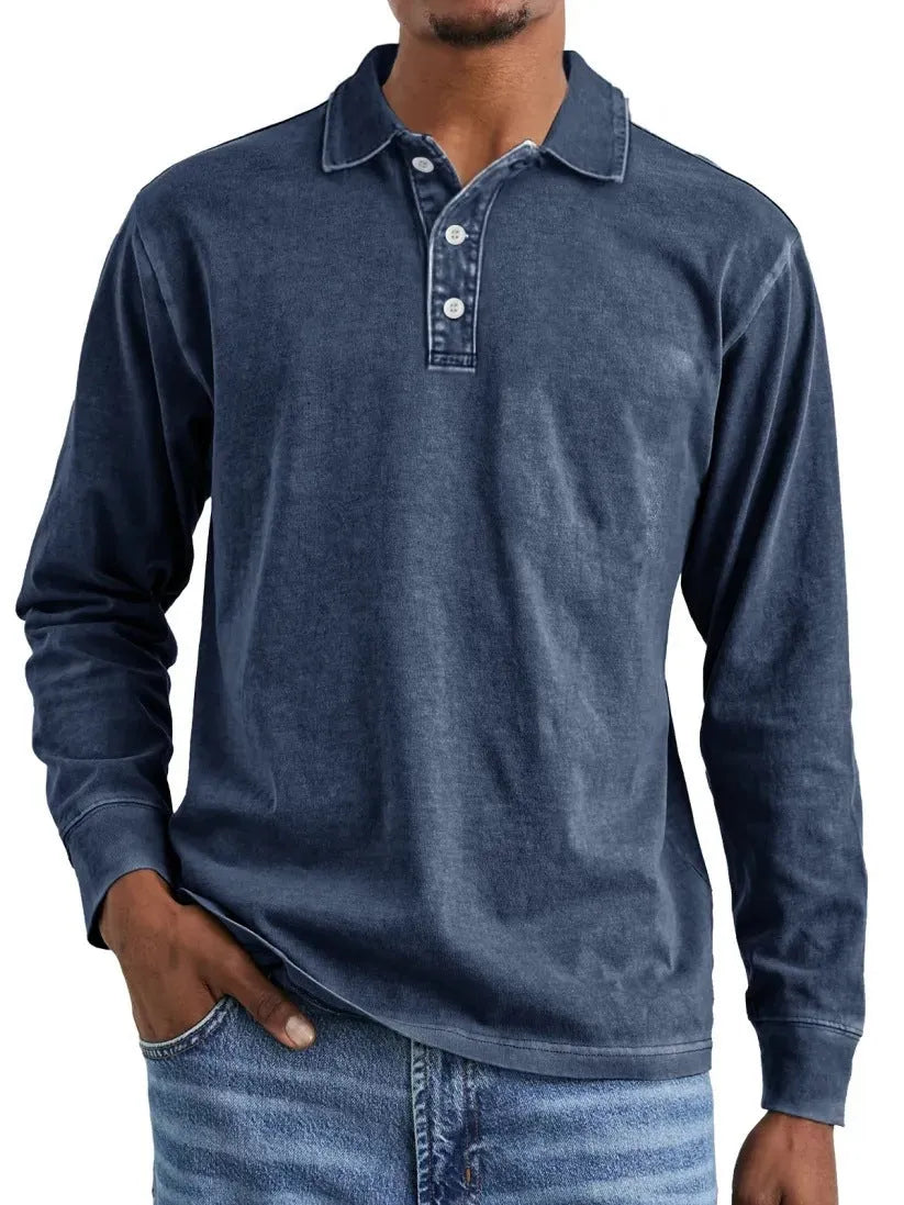 Man wearing a retro washed army green long sleeve polo shirt with a lapel collar and distressed detailing.