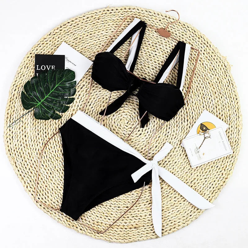 Black high-waisted women's bikini swimsuit set with separate top and bottom