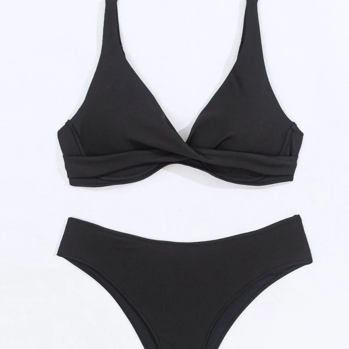 Women's solid colour bikini set in polyester rib fabric, shown on a hanger.