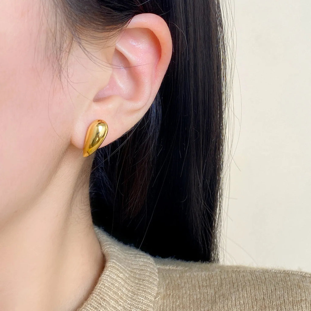 Geometric copper droplet earrings for women with electroplated finish, available as ear clips or studs