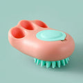 Multi-colour plastic pet bath brush with bristles on one side and a cat claw comb design on the reverse.