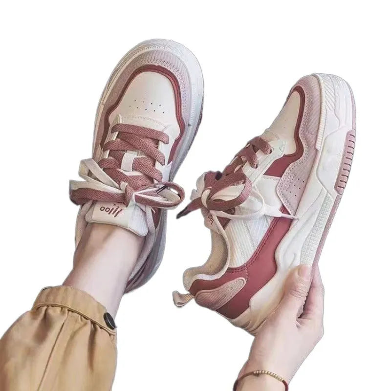 Spring low-top sneakers with rubber sole in beige and pink colour options on a white background