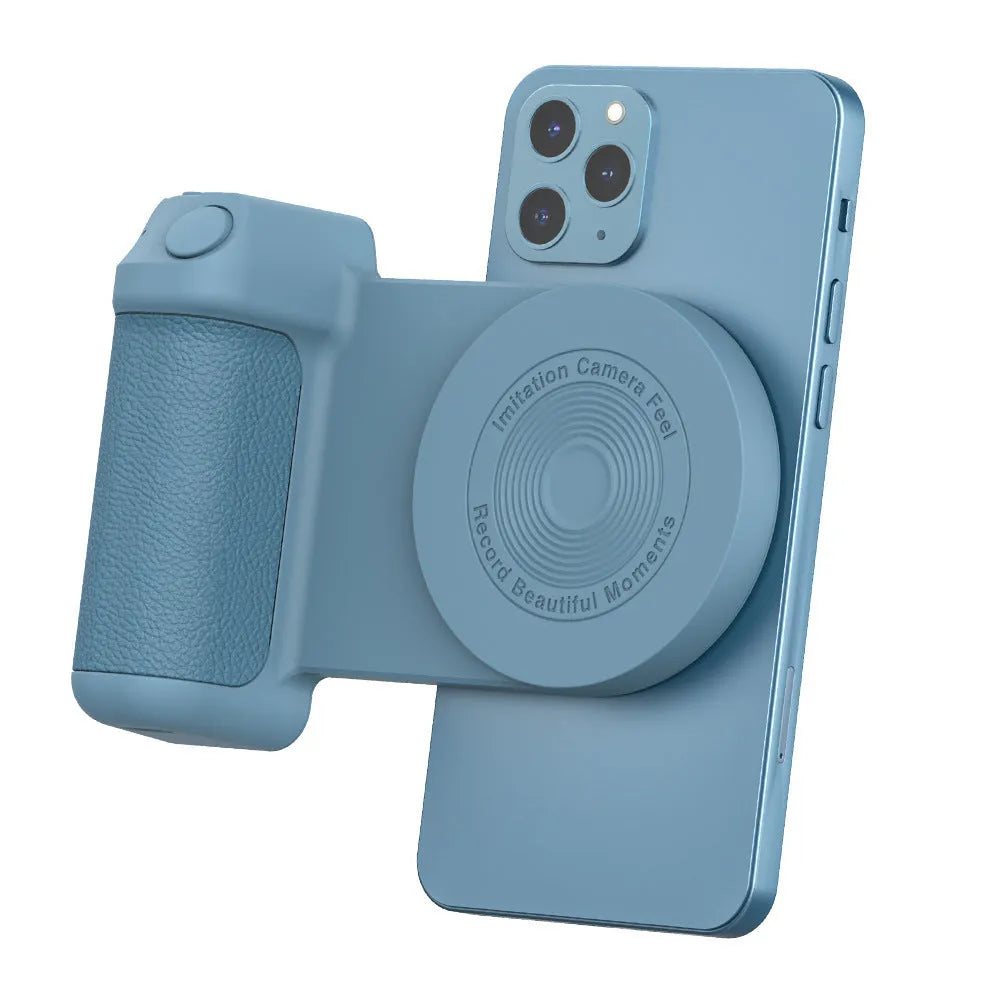 Black magnetic phone camera grip holder with rotatable bracket on a table.