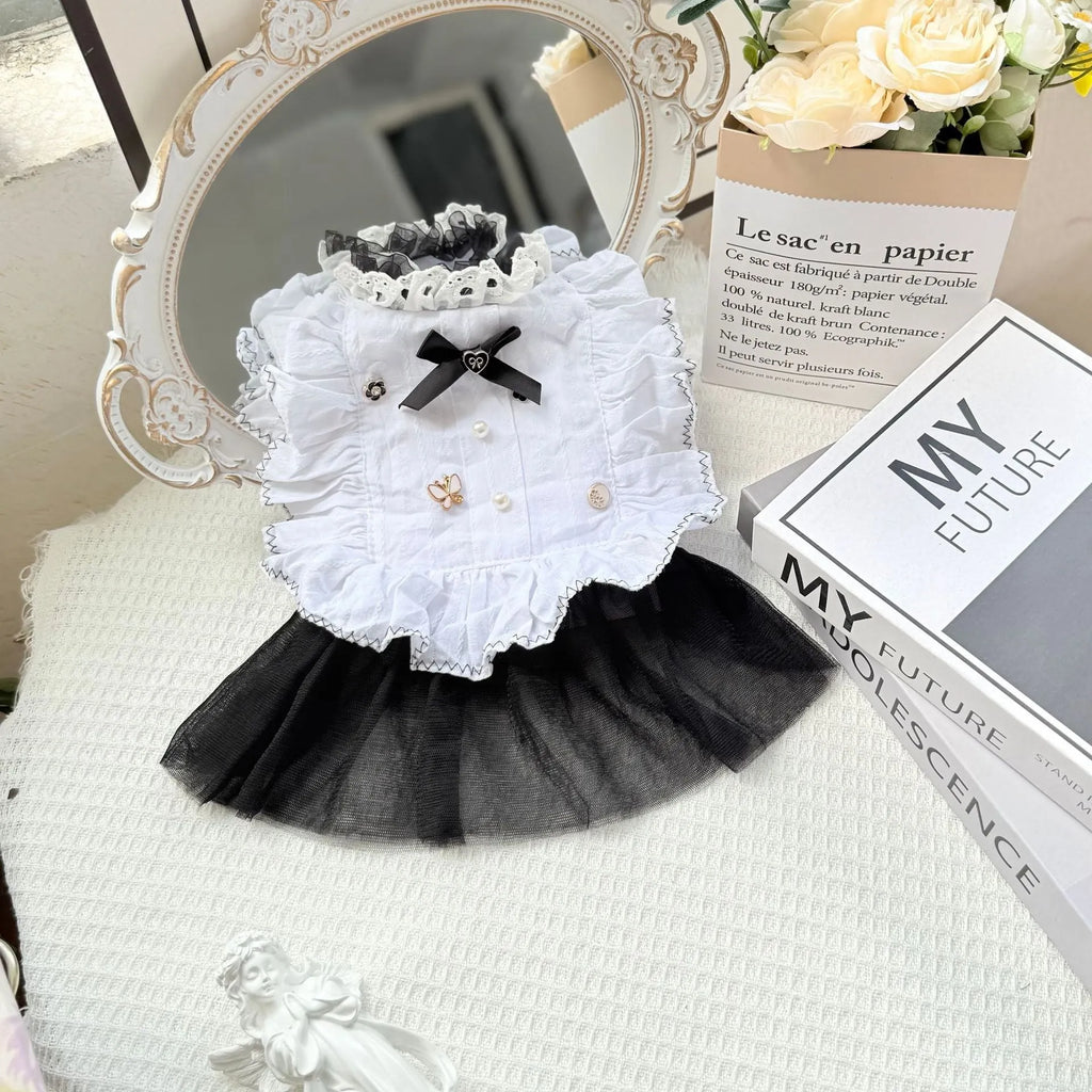 White polyester princess-style gauze skirt dress for a small dog on a mannequin.