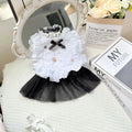 White polyester princess-style gauze skirt dress for a small dog on a mannequin.