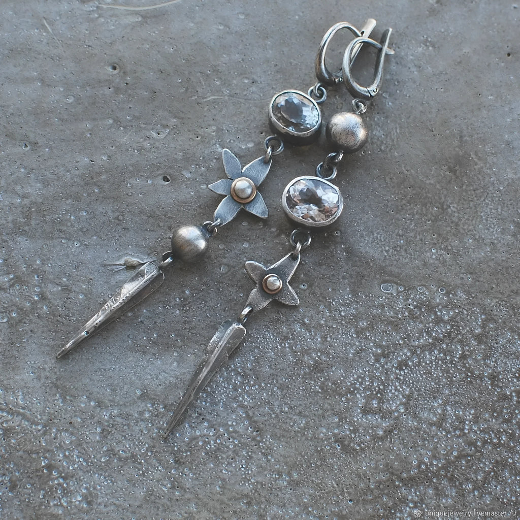 Geometric antique silver pendant earrings with rhinestone accents and long drop design
