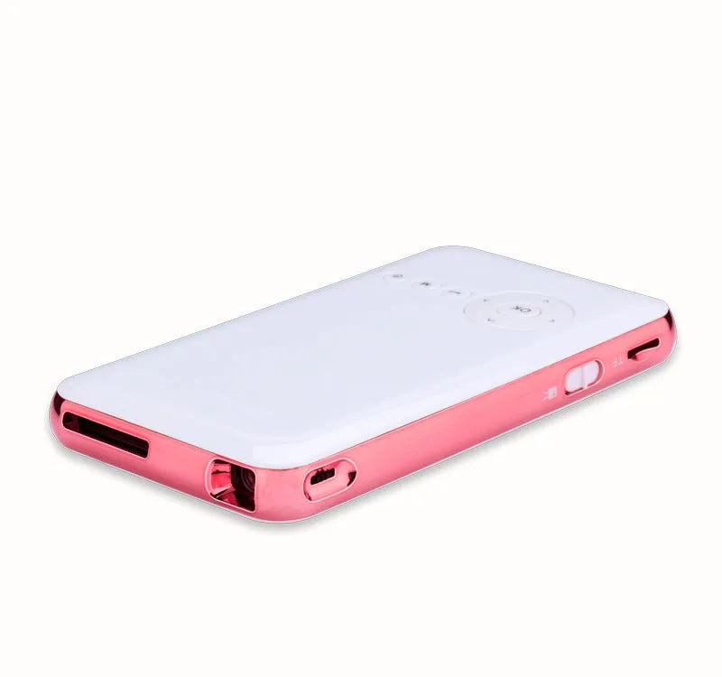 White and rose gold M6S miniature portable Android smart DLP projector on a surface.