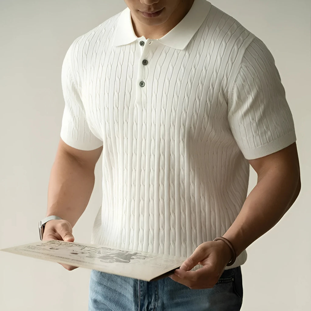 Men's khaki short sleeve business top laid flat, showing collar and button detail.