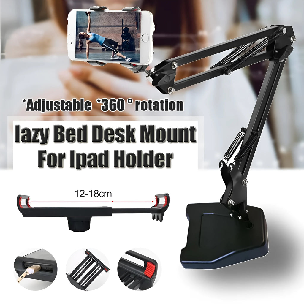 Black universal phone stand with long rotating metal arms and a heavy round base on a wooden desk.