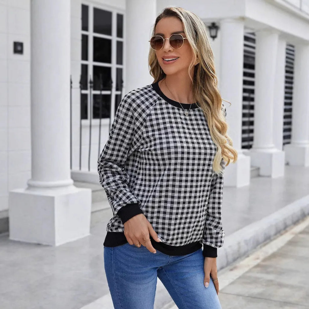 Black pullover sweater with Japanese plaid and printed stripe patterns, long sleeves